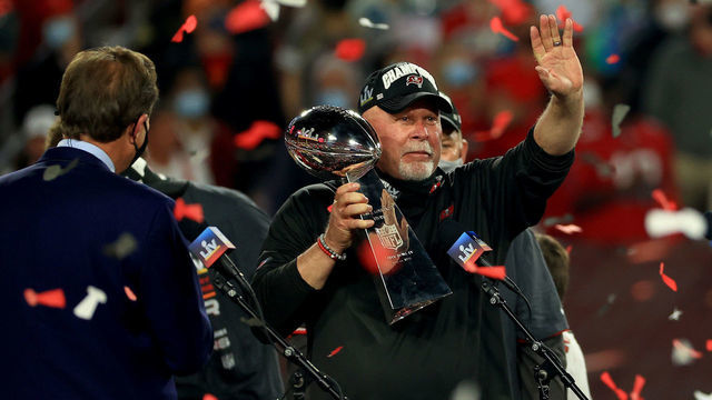 TAMPA, FLORIDA - FEBRUARY 07: Head coach Bruce Arians of the Tampa Bay Buccaneers lifts the Lombardi Trophy after defeating the Kansas City Chiefs in Super Bowl LV at Raymond James Stadium on February 07, 2021 in Tampa, Florida. The Buccaneers defeated the Chiefs 31-9.