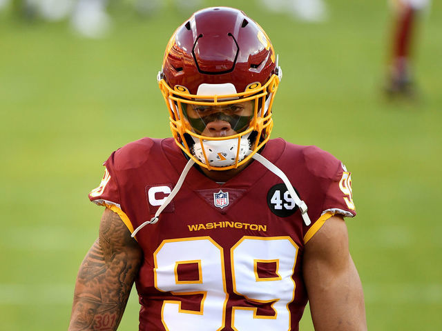 LANDOVER, MARYLAND - DECEMBER 27: Chase Young #99 of the Washington Football Team warms up prior to the game against the Carolina Panthers at FedExField on December 27, 2020 in Landover, Maryland.