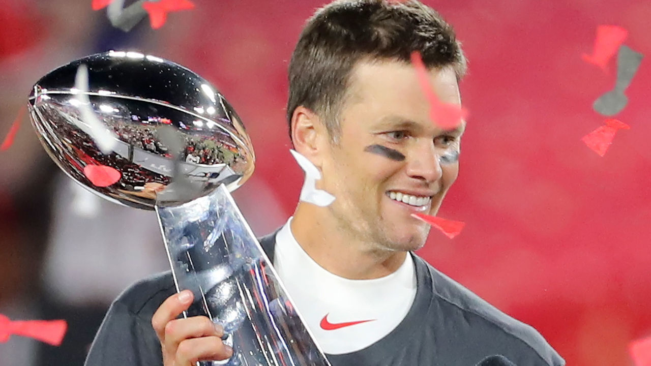 TAMPA, FL - FEBRUARY 07: Super Bowl MVP Tom Brady (12) of the Buccaneers holds the Lombardi Trophy after the Super Bowl LV game between the Kansas City Chiefs and the Tampa Bay Buccaneers on February 7, 2021 at Raymond James Stadium, in Tampa, FL.