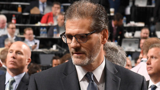 DALLAS, TX - JUNE 22: (L-R) SVP Bobby Clarke, general manager Ron Hextall and assistant general manager Chris Pryor of the Philadelphia Flyers talk on the draft floor during the first round of the 2018 NHL Draft at American Airlines Center on June 22, 2018 in Dallas, Texas.