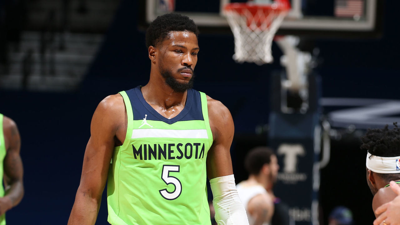 MINNEAPOLIS, MN - JANUARY 23: Malik Beasley #5 of the Minnesota Timberwolves hi-fives his teammates during the game against the New Orleans Pelicans on January 23, 2021 at Target Center in Minneapolis, Minnesota. Mandatory Copyright Notice: Copyright 2021 NBAE