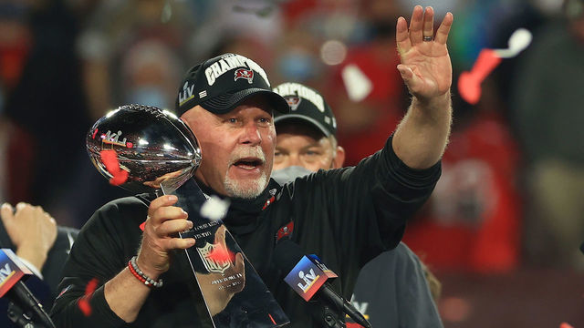 TAMPA, FLORIDA - FEBRUARY 07: Head coach Bruce Arians of the Tampa Bay Buccaneers lifts the Lombardi Trophy after defeating the Kansas City Chiefs in Super Bowl LV at Raymond James Stadium on February 07, 2021 in Tampa, Florida. The Buccaneers defeated the Chiefs 31-9.