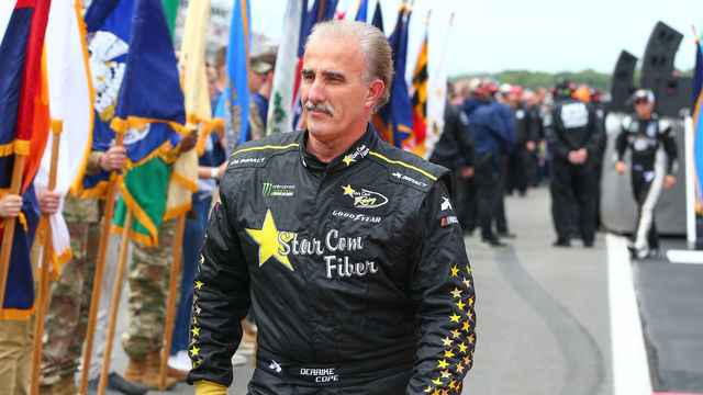 LONG POND, PA - JUNE 03: Derrike Cope (99) in a Chevrolet as he walks out during driver introductions prior to the Monster Energy NASCAR Cup Series - Pocono 400 on June 3, 2018 at Pocono Raceway in Long Pond, PA.