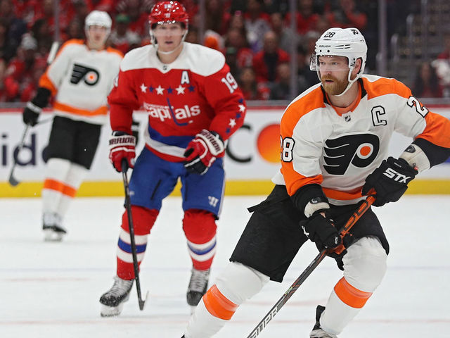 WASHINGTON, DC - MARCH 04: Claude Giroux #28 of the Philadelphia Flyers skates past Nicklas Backstrom #19 of the Washington Capitals during the first period at Capital One Arena on March 4, 2020 in Washington, DC.