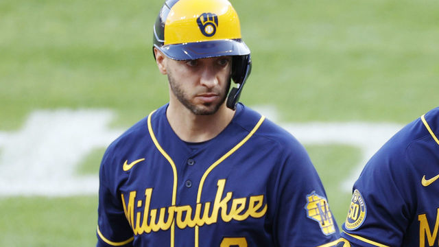 CINCINNATI, OH - SEPTEMBER 21: Christian Yelich #22 and Ryan Braun #8 of the Milwaukee Brewers look on during a game against the Cincinnati Reds at Great American Ball Park on September 21, 2020 in Cincinnati, Ohio. The Reds won 6-3.