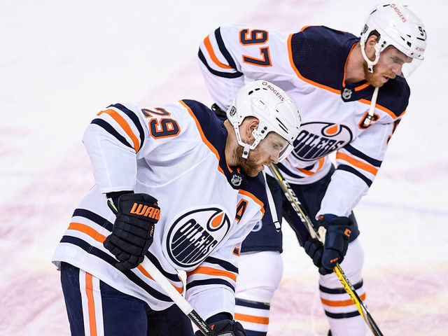 CALGARY, AB - FEBRUARY 06: Edmonton Oilers Center Leon Draisaitl (29) and Edmonton Oilers Center Connor McDavid (97) warm up before an NHL game where the Calgary Flames hosted the Edmonton Oilers on February 6, 2021, at the Scotiabank Saddledome in Calgary, AB.