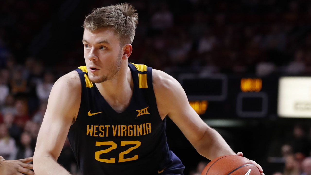 AMES, IA - MARCH 03: Sean McNeil #22 of the West Virginia Mountaineers drives then ball in the second half of the play at Hilton Coliseum on March 3, 2020 in Ames, Iowa. The West Virginia Mountaineers won 77-71 over the Iowa State Cyclones.
