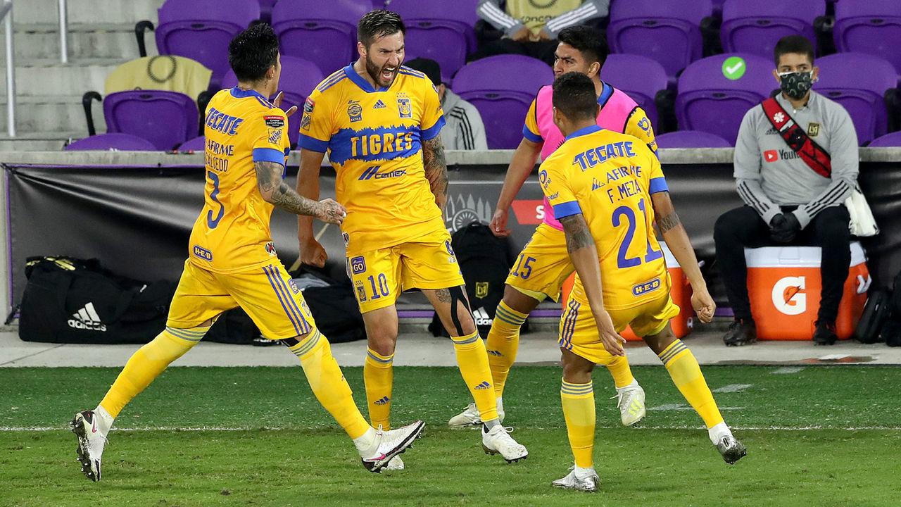 ORLANDO, FL - DECEMBER 22: Andre-Pierre Gignac #10 of Tigres UANL celebrates the game winning goal with Carlos Salcedo #3 of Tigres UANL, Francisco Meza #21 of Tigres UANL and Francisco Venegas #15 of Tigres UANL during the CONCACAF Champions League final game against Los Angeles FC at Exploria Stadium on December 22, 2020 in Orlando, Florida.