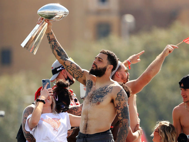 TAMPA, FLORIDA - FEBRUARY 10: Mike Evans #13 of the Tampa Bay Buccaneers celebrates with the Vince Lombardi Trophy during the Tampa Bay Buccaneers Super Bowl boat parade on February 10, 2021 after defeating the Kansas City Chiefs 31-9 in Super Bowl LV in Tampa, Florida.