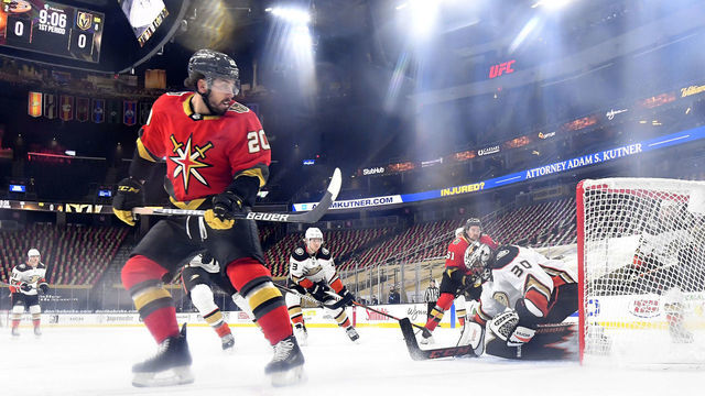 LAS VEGAS, NEVADA - FEBRUARY 09: Chandler Stephenson #20 of the Vegas Golden Knights scores a goal against Ryan Miller #30 of the Anaheim Ducks during the first period at T-Mobile Arena on February 09, 2021 in Las Vegas, Nevada.