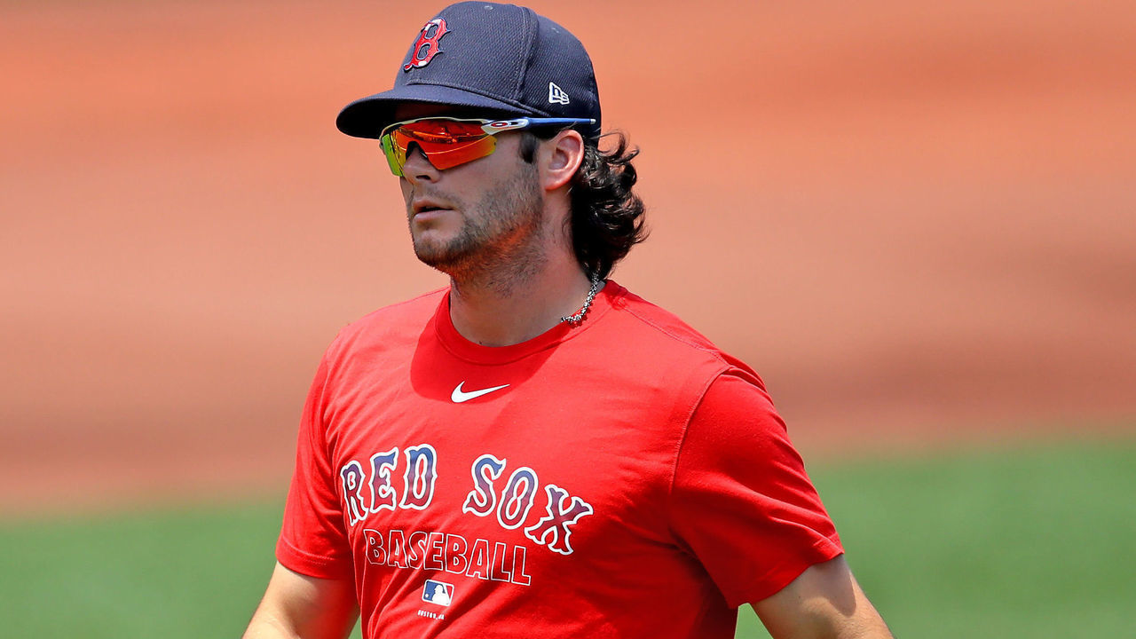 BOSTON, MASSACHUSETTS - JULY 12: Andrew Benintendi #16 of the Boston Red Sox looks on during Summer Workouts at Fenway Park on July 12, 2020 in Boston, Massachusetts.