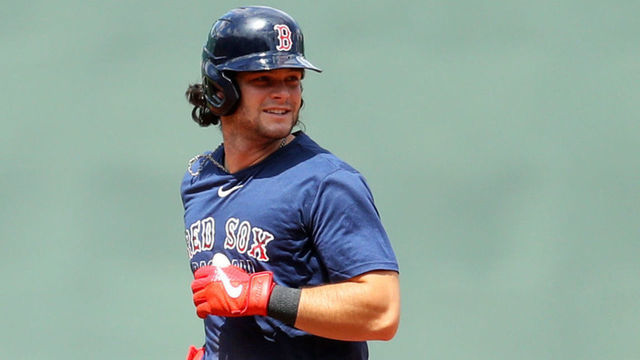 BOSTON, MASSACHUSETTS - JULY 11: Andrew Benintendi #16 of the Boston Red Sox looks on in an intrasquad game during Summer Workouts at Fenway Park on July 11, 2020 in Boston, Massachusetts.