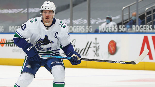 TORONTO, ON - FEBRUARY 4: Bo Horvat #53 of the Vancouver Canucks skates against the Toronto Maple Leafs during an NHL game at Scotiabank Arena on February 4, 2021 in Toronto, Ontario, Canada. The Maple Leafs defeated the Canucks 7-3.