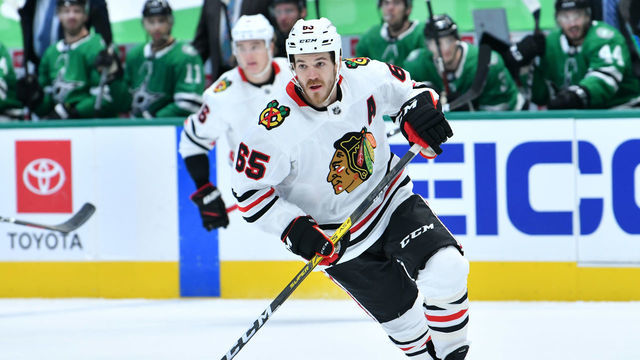 DALLAS, TX - FEBRUARY 9: Andrew Shaw #65 of the Chicago Blackhawks skates against the Dallas Stars at the American Airlines Center on February 9, 2021 in Dallas, Texas.
