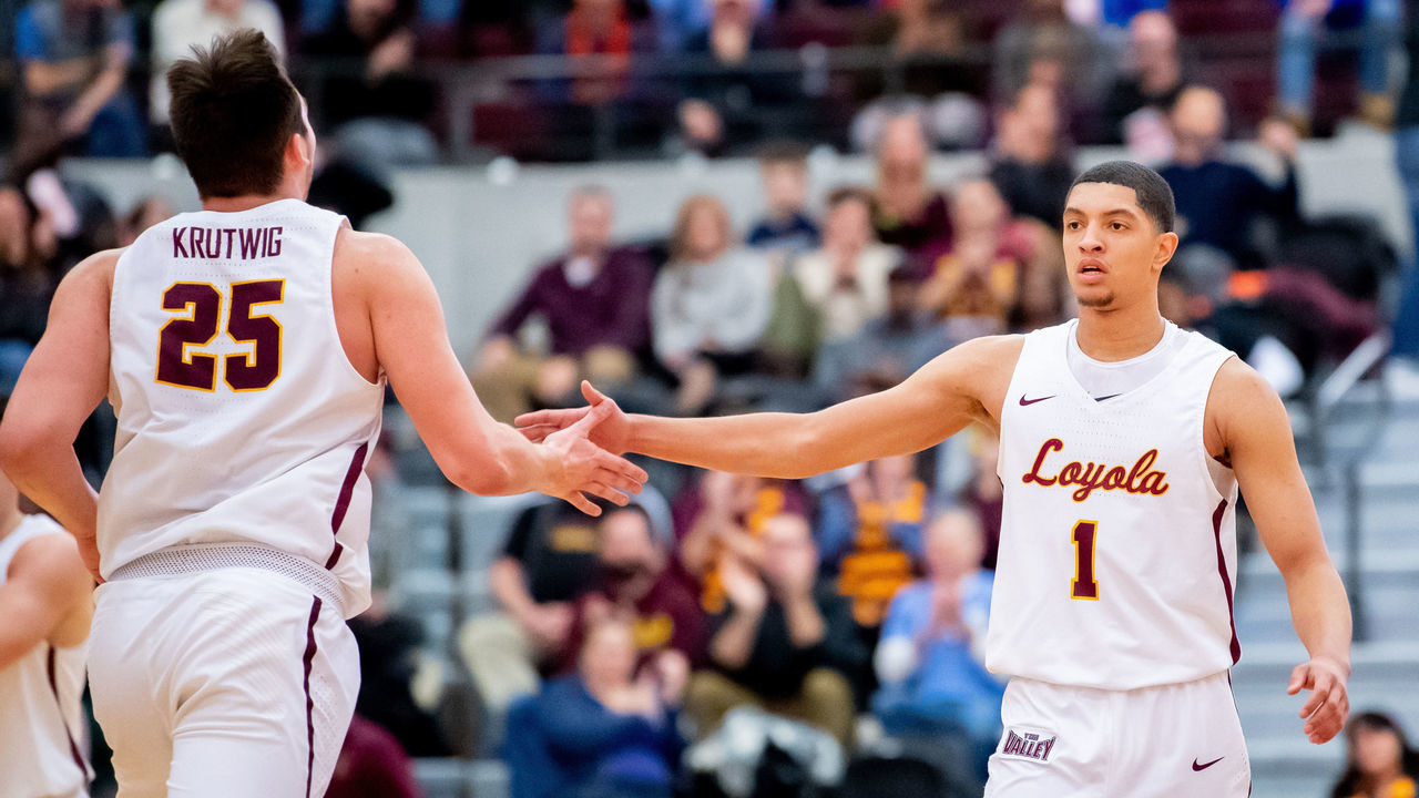 CHICAGO, IL - JANUARY 15: Loyola-Chicago Ramblers guard Lucas Williamson (1) celebrates with Loyola-Chicago Ramblers center Cameron Krutwig (25) during a game between the Valparaiso Crusaders and the Loyola-Chicago Ramblers on January 15, 2019, at the Joseph J. Gentile Arena in Chicago, IL.