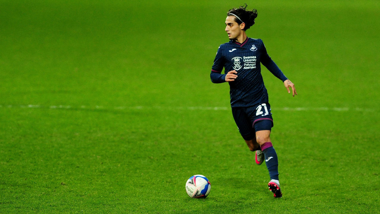 LONDON, ENGLAND - DECEMBER 26: Yan Dhanda of Swansea City in action during the Sky Bet Championship match between Queens Park Rangers and Swansea City at the Kiyan Prince Foundation Stadium on December 26, 2020 in London, England.