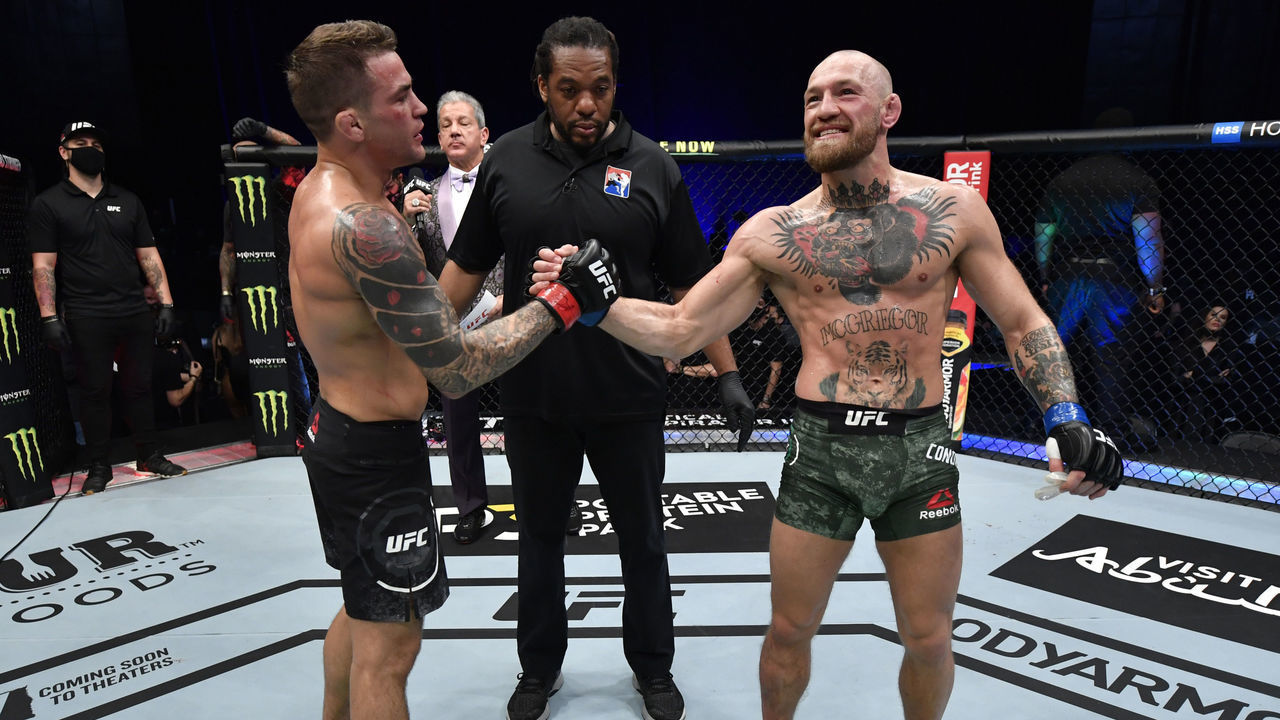 ABU DHABI, UNITED ARAB EMIRATES - JANUARY 23: (L-R) Dustin Poirier greets Conor McGregor of Ireland after his victory in their lightweight fight during the UFC 257 event inside Etihad Arena on UFC Fight Island on January 23, 2021 in Abu Dhabi, United Arab Emirates.