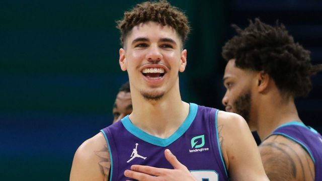 CHARLOTTE, NC - FEBRUARY 8: LaMelo Ball #2 of the Charlotte Hornets smiles during the game against the Houston Rockets on February 8, 2021 at Spectrum Center in Charlotte, North Carolina. Mandatory Copyright Notice: Copyright 2021 NBAE
