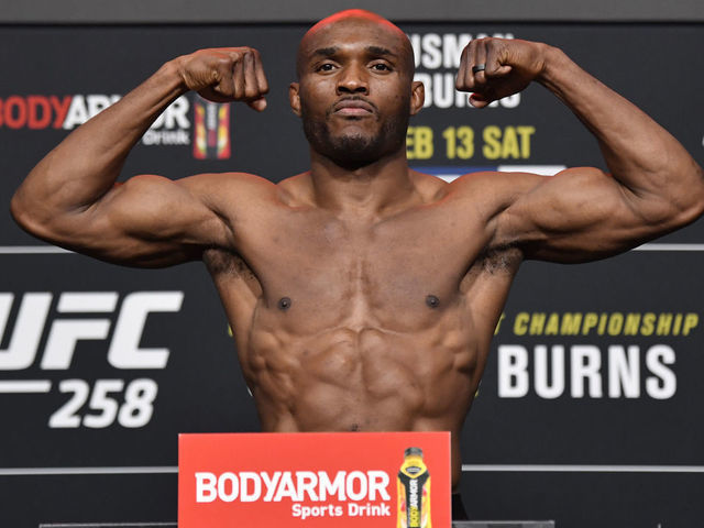 LAS VEGAS, NEVADA - FEBRUARY 12: Kamaru Usman of Nigeria poses on the scale during the UFC weigh-in at UFC APEX on February 12, 2021 in Las Vegas, Nevada.