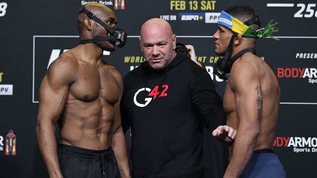 LAS VEGAS, NEVADA - FEBRUARY 12: (L-R) Opponents Kamaru Usman of Nigeria and Gilbert Burns of Brazil face off during the UFC weigh-in at UFC APEX on February 12, 2021 in Las Vegas, Nevada.