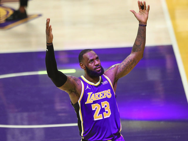 LOS ANGELES, CALIFORNIA - FEBRUARY 12: LeBron James #23 of the Los Angeles Lakers celebrates his basket at the end of the third quarter against the Memphis Grizzlies at Staples Center on February 12, 2021 in Los Angeles, California.