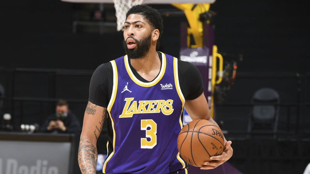 LOS ANGELES, CA - FEBRUARY 12: Anthony Davis #3 of the Los Angeles Lakers handles the ball during the game against the Memphis Grizzlies on February 12, 2021 at STAPLES Center in Los Angeles, California. NOTE TO USER: User expressly acknowledges and agrees that, by downloading and/or using this Photograph, user is consenting to the terms and conditions of the Getty Images License Agreement. Mandatory Copyright Notice: Copyright 2020 NBAE
