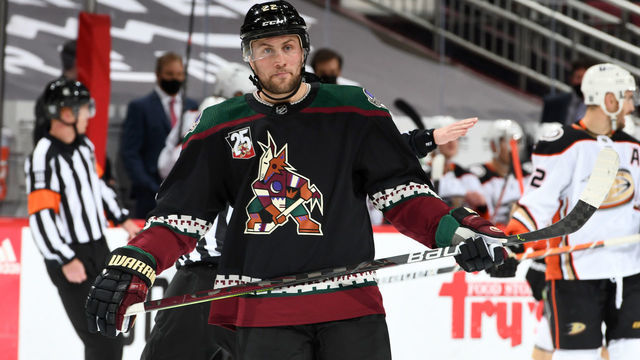 GLENDALE, ARIZONA - JANUARY 28: Johan Larsson #22 of the Arizona Coyotes gets ready prior to a face off against the Anaheim Ducks at Gila River Arena on January 28, 2021 in Glendale, Arizona.