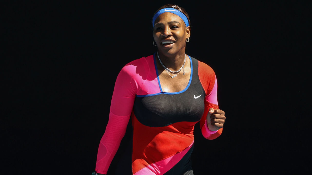 Serena Williams of the US celebrates after victory against Belarus' Aryna Sabalenka during their women's singles match on day seven of the Australian Open tennis tournament in Melbourne on February 14, 2021.