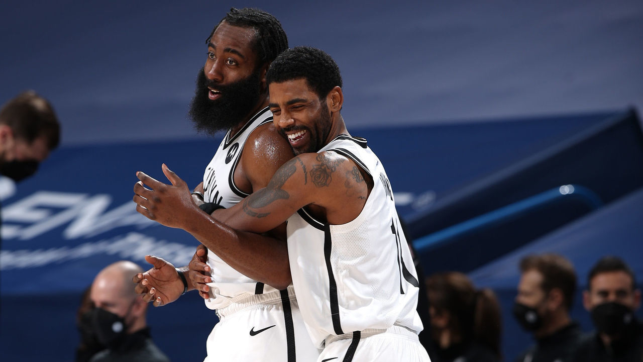 OKLAHOMA CITY, OK - JANUARY 29: Kyrie Irving #11 of the Brooklyn Nets & James Harden #13 of the Brooklyn Nets hug during the game against the Oklahoma City Thunder on January 29, 2021 at Chesapeake Energy Arena in Oklahoma City, Oklahoma. Mandatory Copyright Notice: Copyright 2021 NBAE