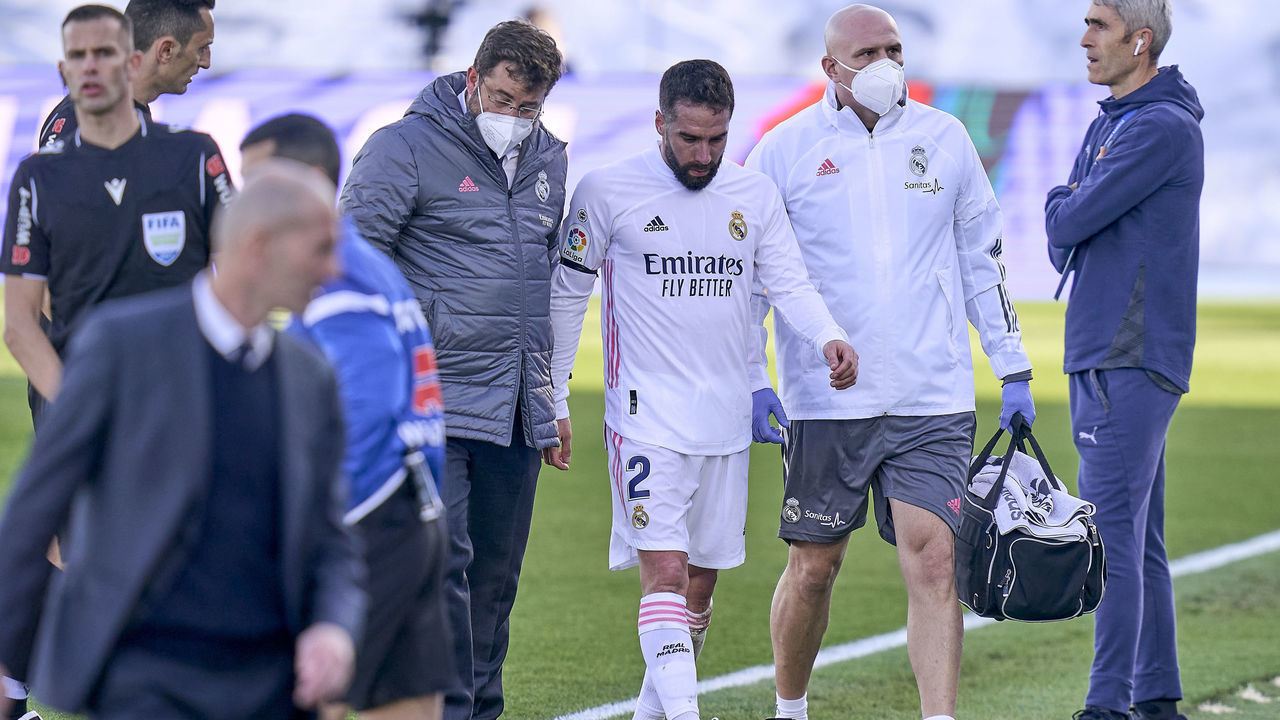 MADRID, SPAIN - FEBRUARY 14: Daniel Carvajal of Real Madrid leaves injured the pitch during the La Liga Santander match between Real Madrid and Valencia CF at Estadio Alfredo Di Stafano on February 14, 2021 in Madrid, Spain.
