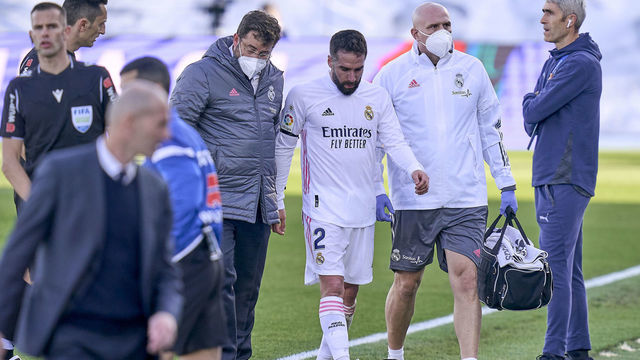 MADRID, SPAIN - FEBRUARY 14: Daniel Carvajal of Real Madrid leaves injured the pitch during the La Liga Santander match between Real Madrid and Valencia CF at Estadio Alfredo Di Stafano on February 14, 2021 in Madrid, Spain.