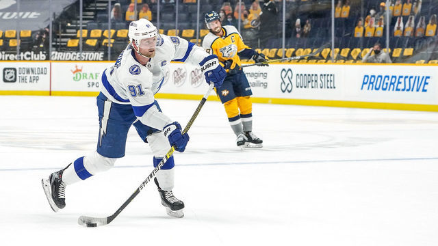NASHVILLE, TN - FEBRUARY 8: Steven Stamkos #91 of the Tampa Bay Lightning scores and empty net goal against the Nashville Predators during the third period at Bridgestone Arena on February 8, 2021 in Nashville, Tennessee.
