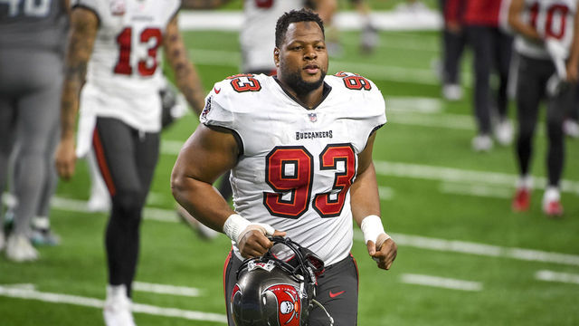 DETROIT, MICHIGAN - DECEMBER 26: Ndamukong Suh #93 of the Tampa Bay Buccaneers runs off the field after the game against the Detroit Lions at Ford Field on December 26, 2020 in Detroit, Michigan.