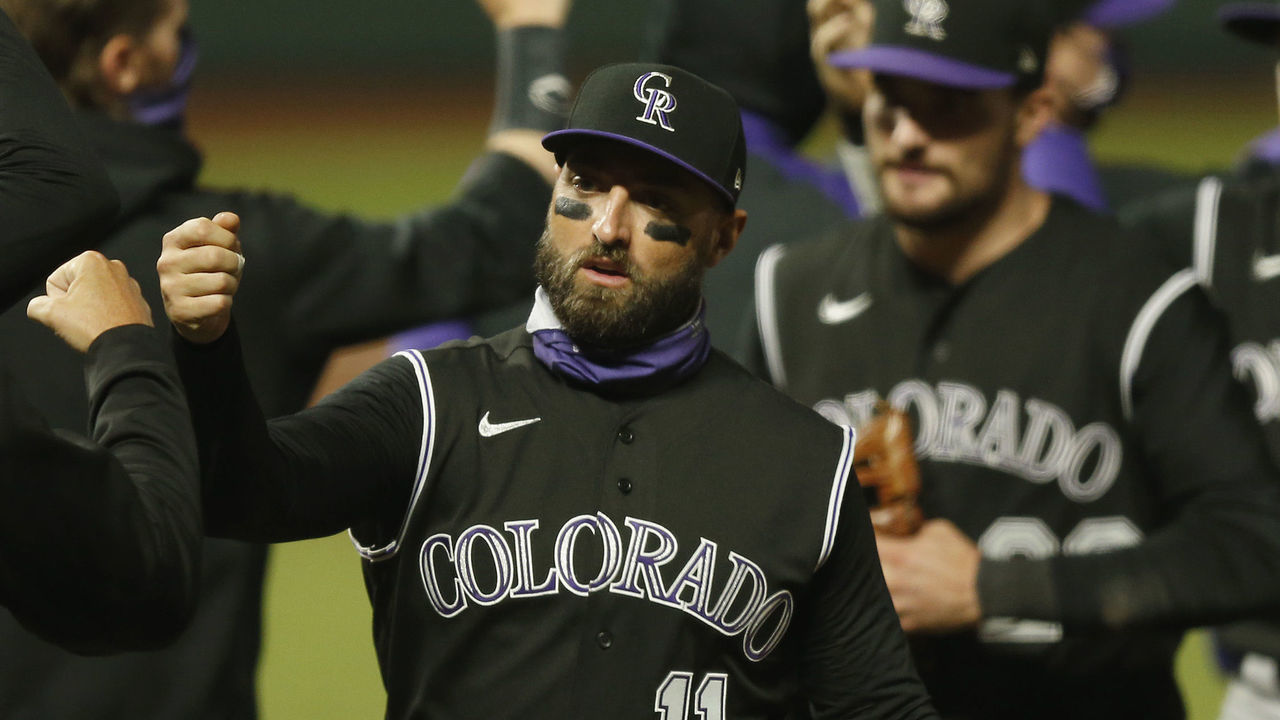 SAN FRANCISCO, CALIFORNIA - SEPTEMBER 21: Kevin Pillar #11 of the Colorado Rockies celebrates with teammates after a win against the San Francisco Giants at Oracle Park on September 21, 2020 in San Francisco, California.