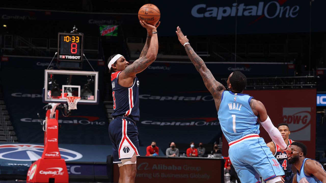 WASHINGTON, DC - FEBRUARY 15: Bradley Beal #3 of the Washington Wizards shoots the ball during the game against the Houston Rockets on February 15, 2021 at Capital One Arena in Washington, DC. Mandatory Copyright Notice: Copyright 2021 NBAE