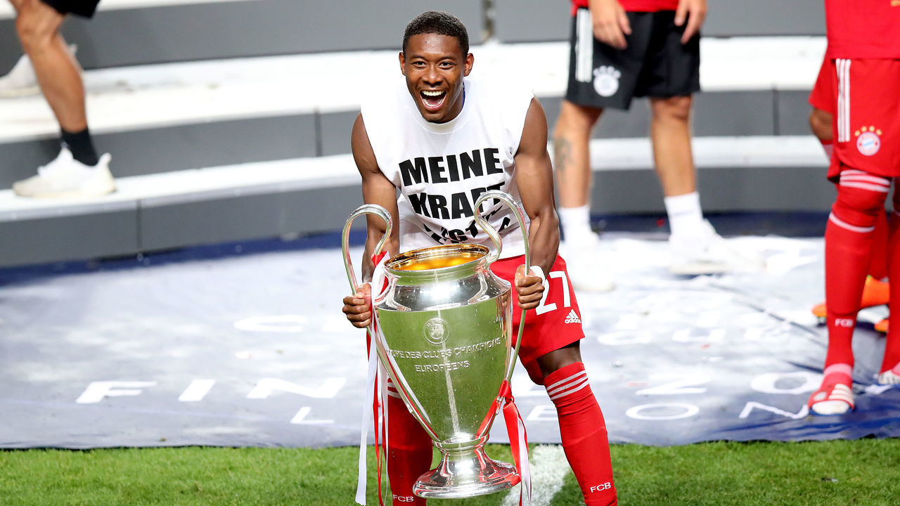 LISBON, PORTUGAL - AUGUST 23: David Alaba of Bayern Muenchen celebrates with the trophy during the UEFA Champions League Final match between Paris Saint-Germain and Bayern Munich at Estadio do Sport Lisboa e Benfica on August 23, 2020 in Lisbon, Portugal.