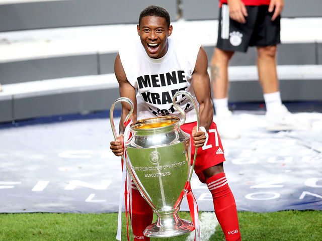 LISBON, PORTUGAL - AUGUST 23: David Alaba of Bayern Muenchen celebrates with the trophy during the UEFA Champions League Final match between Paris Saint-Germain and Bayern Munich at Estadio do Sport Lisboa e Benfica on August 23, 2020 in Lisbon, Portugal.