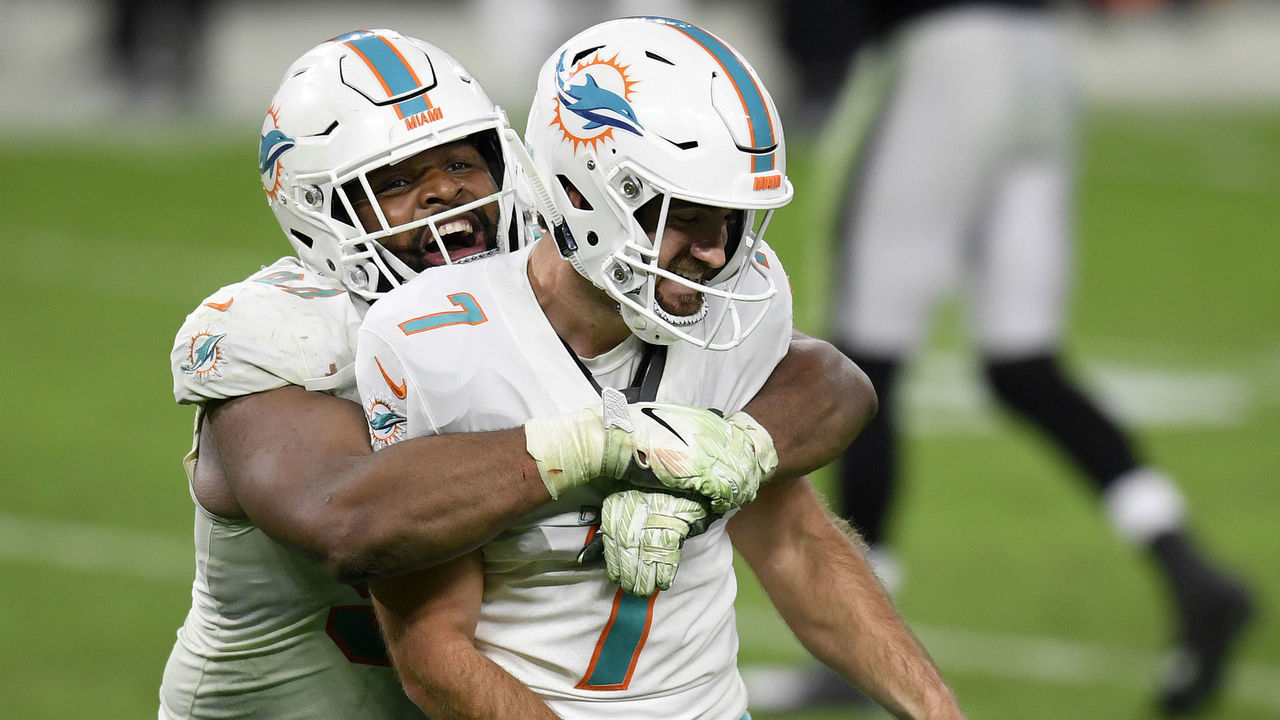LAS VEGAS, NEVADA - DECEMBER 26: Christian Wilkins #94 of the Miami Dolphins celebrates a 26-25 win over the Las Vegas Raiders with Jason Sanders #7 at Allegiant Stadium on December 26, 2020 in Las Vegas, Nevada.