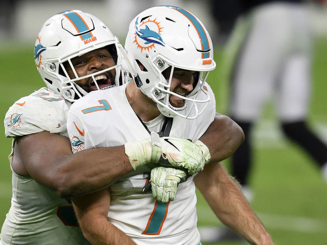 LAS VEGAS, NEVADA - DECEMBER 26: Christian Wilkins #94 of the Miami Dolphins celebrates a 26-25 win over the Las Vegas Raiders with Jason Sanders #7 at Allegiant Stadium on December 26, 2020 in Las Vegas, Nevada.