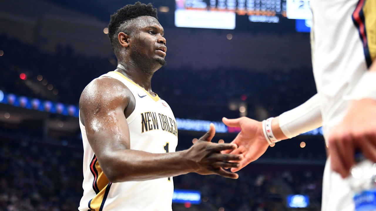 CLEVELAND, OHIO - JANUARY 28: Zion Williamson #1 of the New Orleans Pelicans celebrates with a teammate as he leaves the game during the first half against the Cleveland Cavaliers at Rocket Mortgage Fieldhouse on January 28, 2020 in Cleveland, Ohio. NOTE TO USER: User expressly acknowledges and agrees that, by downloading and/or using this photograph, user is consenting to the terms and conditions of the Getty Images License Agreement.