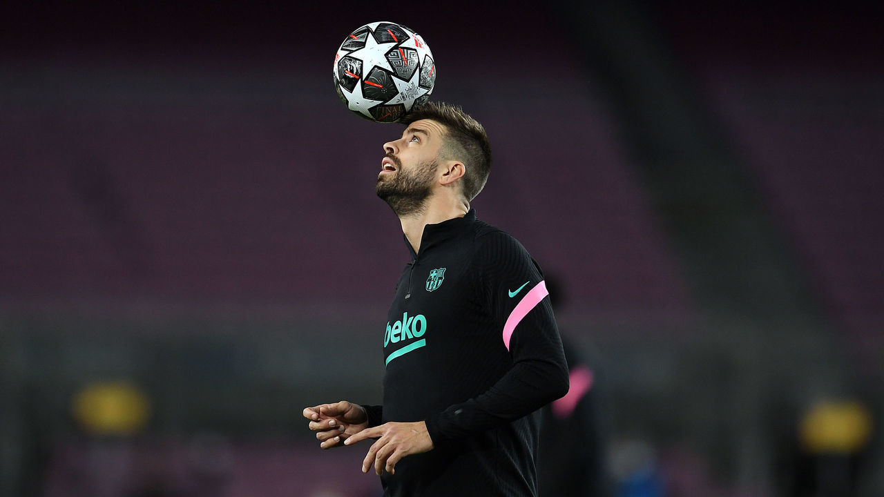BARCELONA, SPAIN - FEBRUARY 16: Gerard Pique of FC Barcelona warms up prior to the UEFA Champions League Round of 16 match between FC Barcelona and Paris Saint-Germain at Camp Nou on February 16, 2021 in Barcelona, Spain. Sporting stadiums around Spain remain under strict restrictions due to the Coronavirus Pandemic as Government social distancing laws prohibit fans inside venues resulting in games being played behind closed doors.
