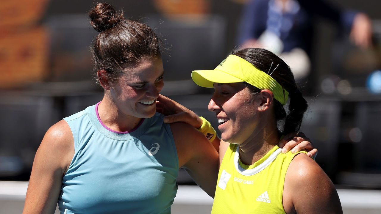 Jennifer Brady (L) of the US gives a hug Jessica Pegula of the US after winning her women's singles quater-final match on day ten of the Australian Open tennis tournament in Melbourne on February 17, 2021.