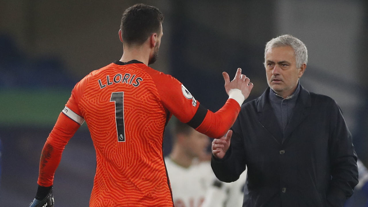 Tottenham Hotspur's Portuguese head coach Jose Mourinho (R) shakes hands with Tottenham Hotspur's French goalkeeper Hugo Lloris after a 0-0 draw in the English Premier League football match between Chelsea and Tottenham Hotspur at Stamford Bridge in London on November 29, 2020.