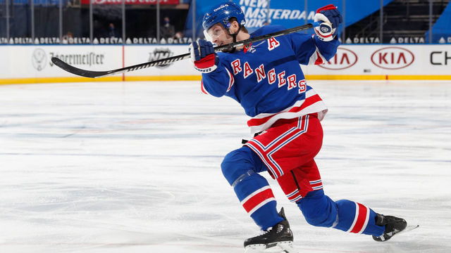 NEW YORK, NY - FEBRUARY 12: Jacob Trouba #8 of the New York Rangers shoots against the Boston Bruins at Madison Square Garden on February 12, 2021 in New York City.