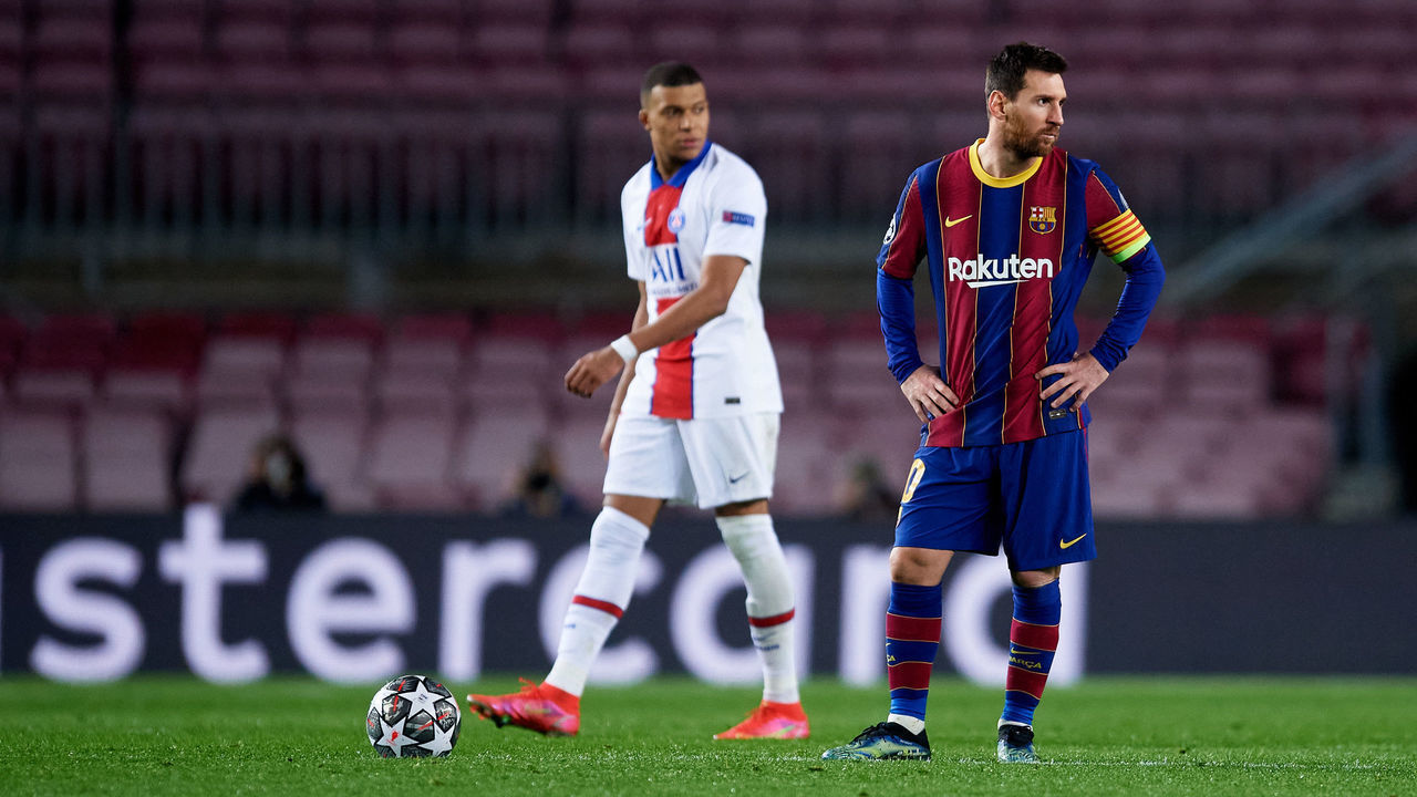 BARCELONA, SPAIN - FEBRUARY 16: Lionel Messi of FC Barcelona looks dejected as Kylian Mbappe of Paris Saint-Germain walks past him after the third goal of Paris Saint-Germain scored by Moise Kean during the UEFA Champions League Round of 16 match between FC Barcelona and Paris Saint-Germain at Camp Nou on February 16, 2021 in Barcelona, Spain. Sporting stadiums around Spain remain under strict restrictions due to the Coronavirus Pandemic as Government social distancing laws prohibit fans inside venues resulting in games being played behind closed doors.