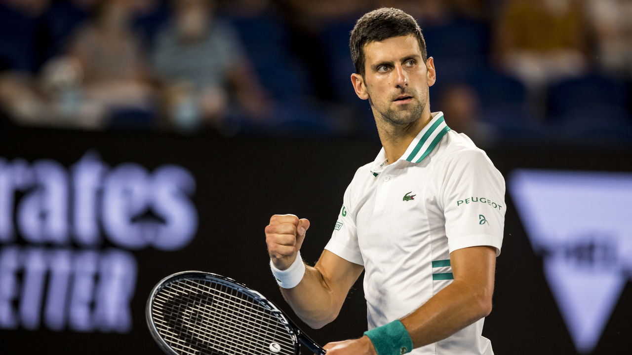 MELBOURNE, VIC - FEBRUARY 18: Novak Djokovic of Serbia celebrates after winning a game during the semifinals of the 2021 Australian Open on February 18 2021, at Melbourne Park in Melbourne, Australia.