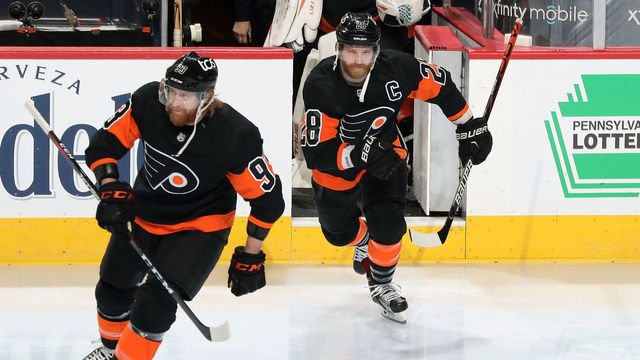 PHILADELPHIA, PA - JANUARY 31: Jakub Voracek #93 and Claude Giroux #93 of the Philadelphia Flyers enter the ice surface prior to the start of their game against the New York Islanders at the Wells Fargo Center on January 31, 2021 in Philadelphia, Pennsylvania.