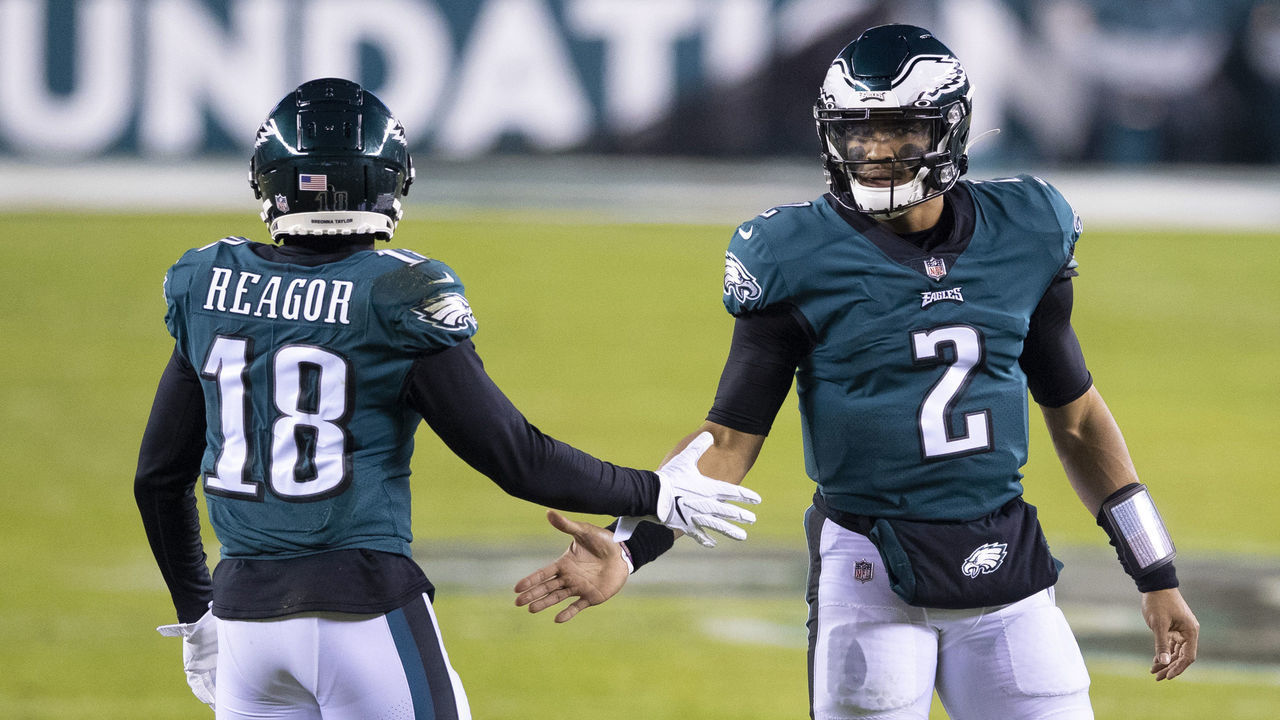 PHILADELPHIA, PA - JANUARY 03: Jalen Reagor #18 and Jalen Hurts #2 of the Philadelphia Eagles react against the Washington Football Team at Lincoln Financial Field on January 3, 2021 in Philadelphia, Pennsylvania.