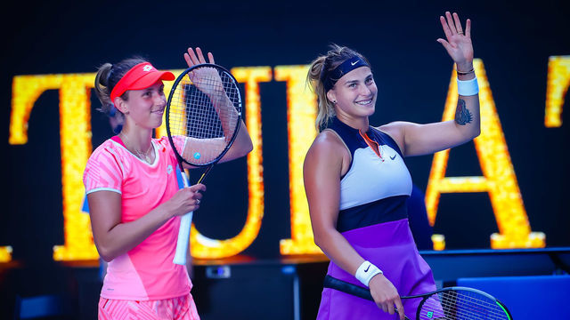 Elise Mertens (WTA 6), Aryna Sabalenka (WTA 5) celebrate after winning a tennis match between Belgian-Belarussian pair Mertens-Sabalenka and Czech pair Krejcikova - Siniakova, in the final of the women's doubles competition of the 'Australian Open' tennis Grand Slam, Friday 19 February 2021 in Melbourne Park, Melbourne, Australia. BELGA PHOTO PATRICK HAMILTON