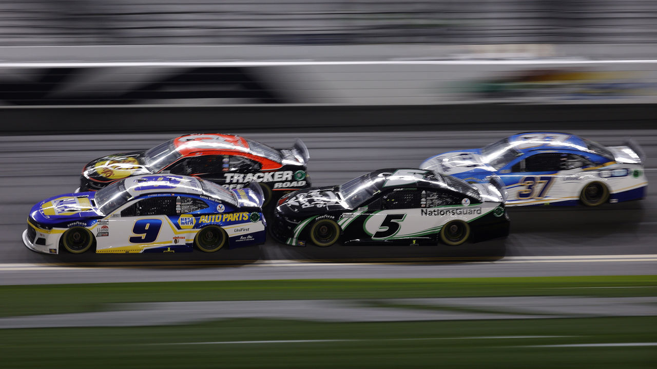 DAYTONA BEACH, FLORIDA - FEBRUARY 14: Chase Elliott, driver of the #9 NAPA Auto Parts Chevrolet, and Kyle Larson, driver of the #5 Nations Guard Chevrolet, race during the NASCAR Cup Series 63rd Annual Daytona 500 at Daytona International Speedway on February 14, 2021 in Daytona Beach, Florida.